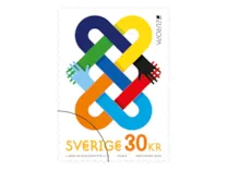 Rullfrimärke med motiv av händer i olika färgglada färger som symboliserar enighet och fred.